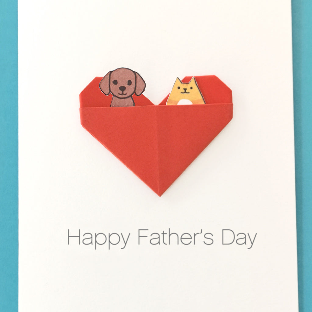 Handmade origami heart card for dog dad and cat dad with custom pet illustrations printed on the front of the card 