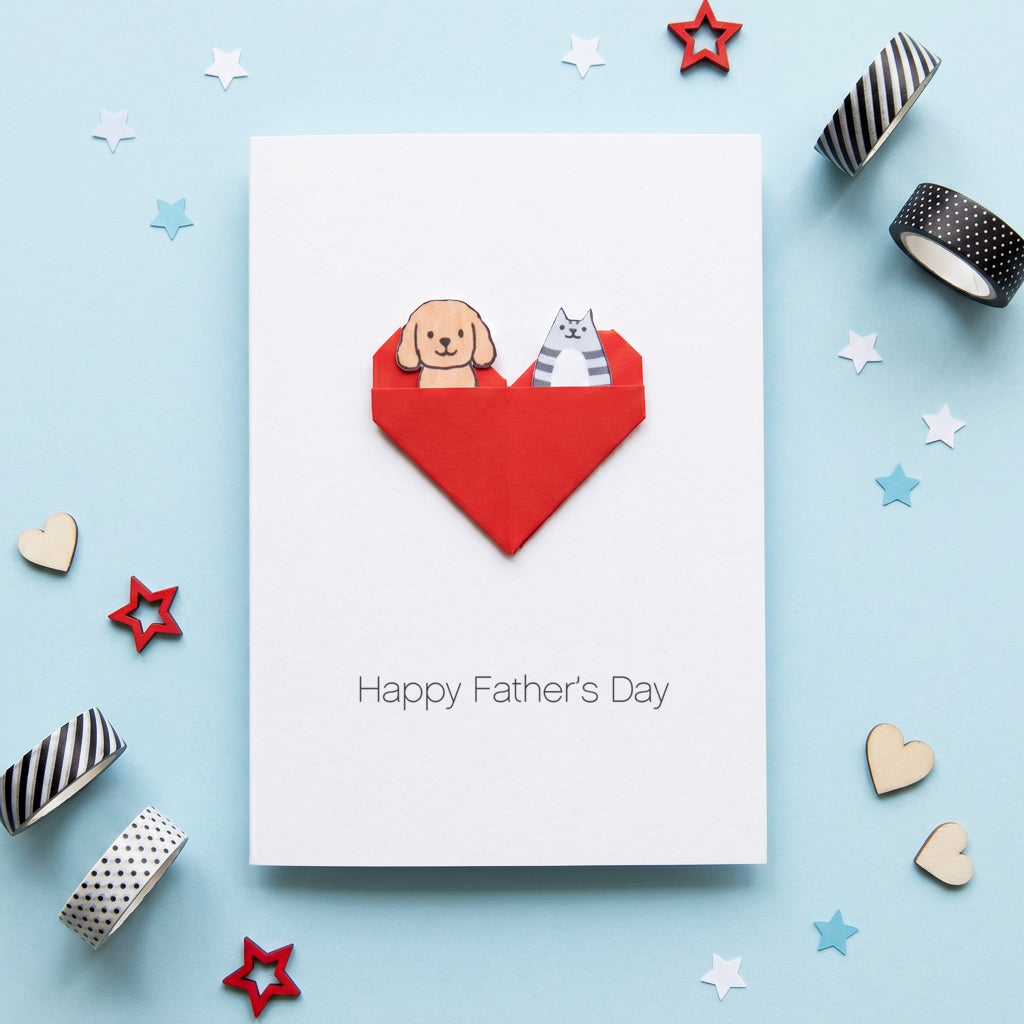 Handmade personalised Fathers Day card with origami heart with a pocket containing a small illustrated dog and cat for proud pet dad 