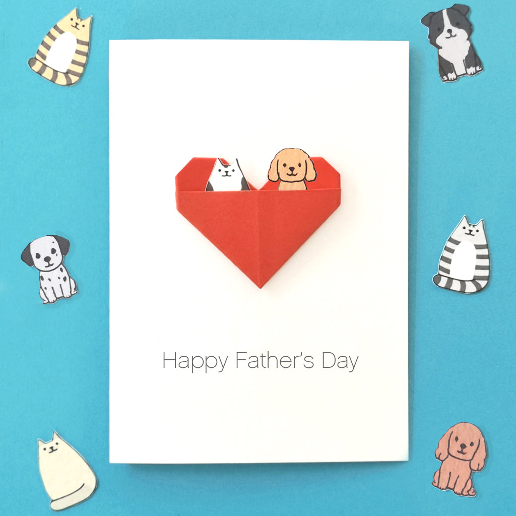 Close up of personalised cat dad and dog dad Fathers Day card with folded origami heart on premium white cardstock 