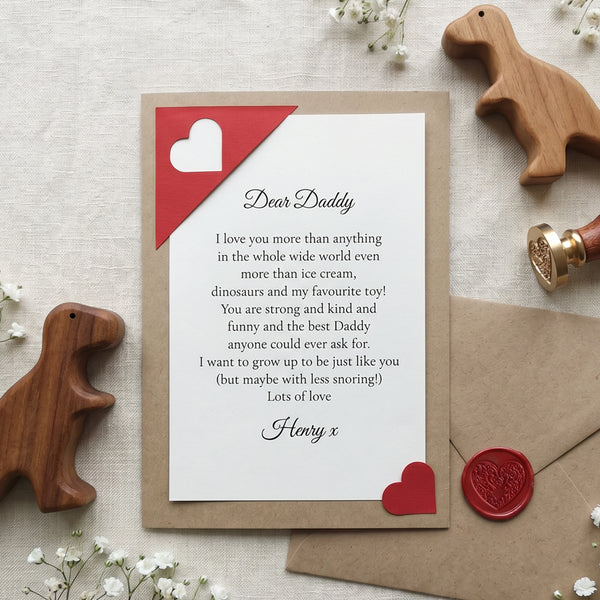 Personalised daddy letter gift from child. A meaningful letter written on behalf of a child on archival paper in a script font reading 'Dear Daddy' then the main body of the letter. Signed in a script font with the child's name. The letter is slotted into a corner bookmark that has a heart shaped hole. The heart that was in the hole is now on the bottom lefthand corner keeping the letter in place. This is a kraft card and is enclosed in a kraft envelope with a heart shaped wax seal ready to gift Daddy.